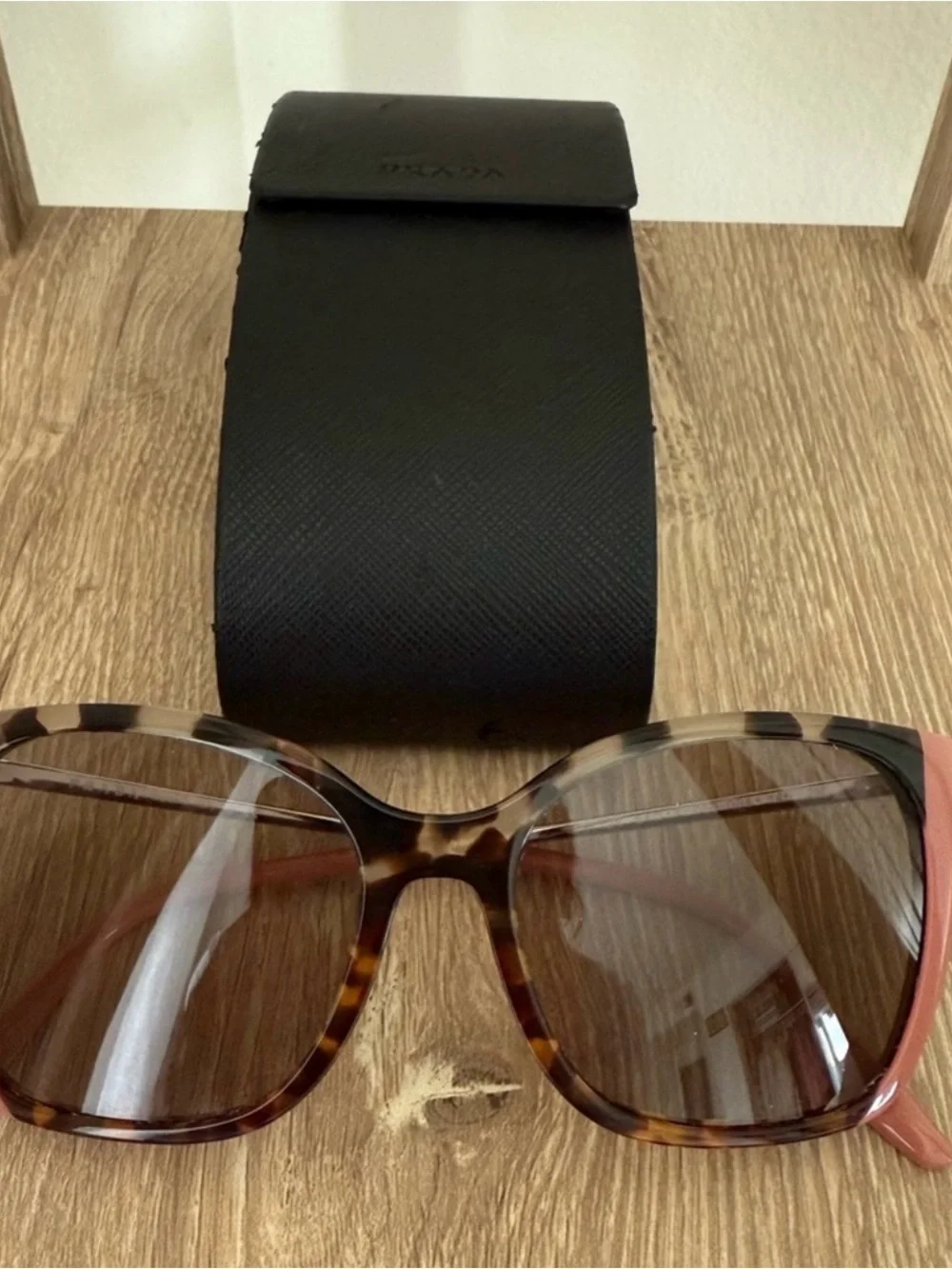 Prada Tortoiseshell Sunglasses with Pink Trim